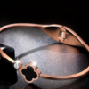 Japanese and Korean version of color gold 18K rose gold four-leaf clover bracelet female black alloy open bracelet jewelry Bracelets 10 Japanese and Korean version of color gold 18K rose gold four-leaf clover bracelet female black alloy open bracelet jewelry Bracelets 10