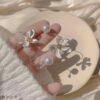 Asymmetrical white flower pearl earrings Earrings 11 Asymmetrical white flower pearl earrings Earrings 11