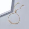 Brass Gold Plated Long Micropaved Zircon Pendant Shrink Pulled Brass Bead Bracelet Bracelets 13 Brass Gold Plated Long Micropaved Zircon Pendant Shrink Pulled Brass Bead Bracelet Bracelets 13