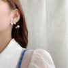 Asymmetrical white flower pearl earrings Earrings 12 Asymmetrical white flower pearl earrings Earrings 12