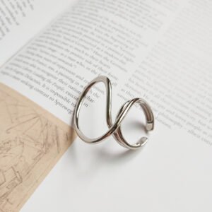Golden multidimensional twisted geometric ring Rings