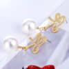 New Fashion Simple Hollow Pearl Women’s Earrings Earrings 12
