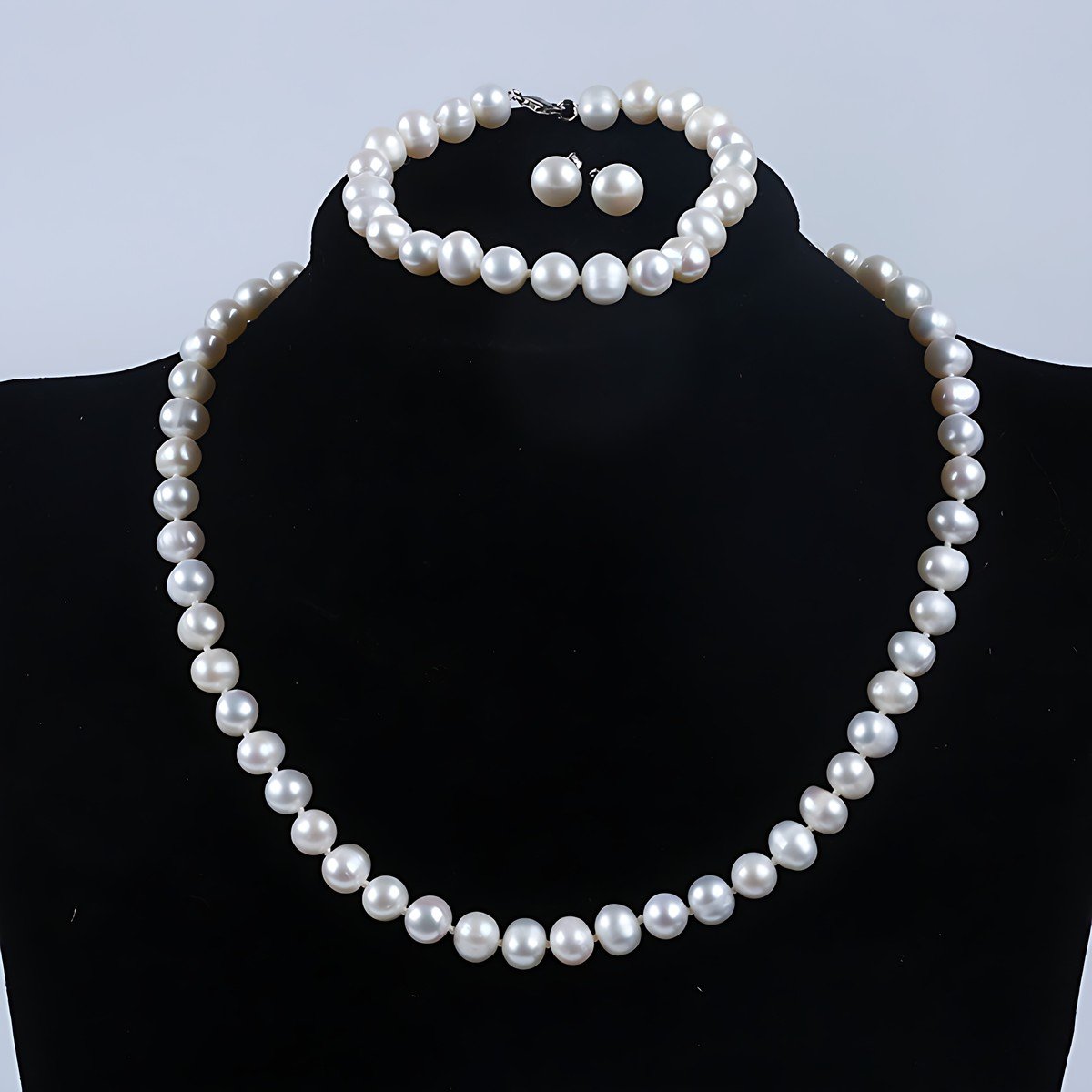 Freshwater Pearl Jewelry Set – Necklace, Bracelet and Stud Earrings 1 freshwater pearl jewelry set – necklace, bracelet and earrings on display