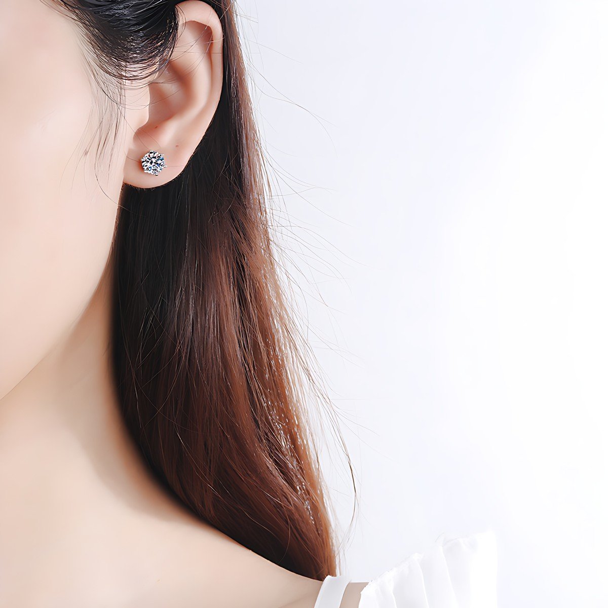 Moissanite Stud Earrings – 6-Prong Round Studs, Sterling Silver 1 moissanite stud earrings – worn on the ear